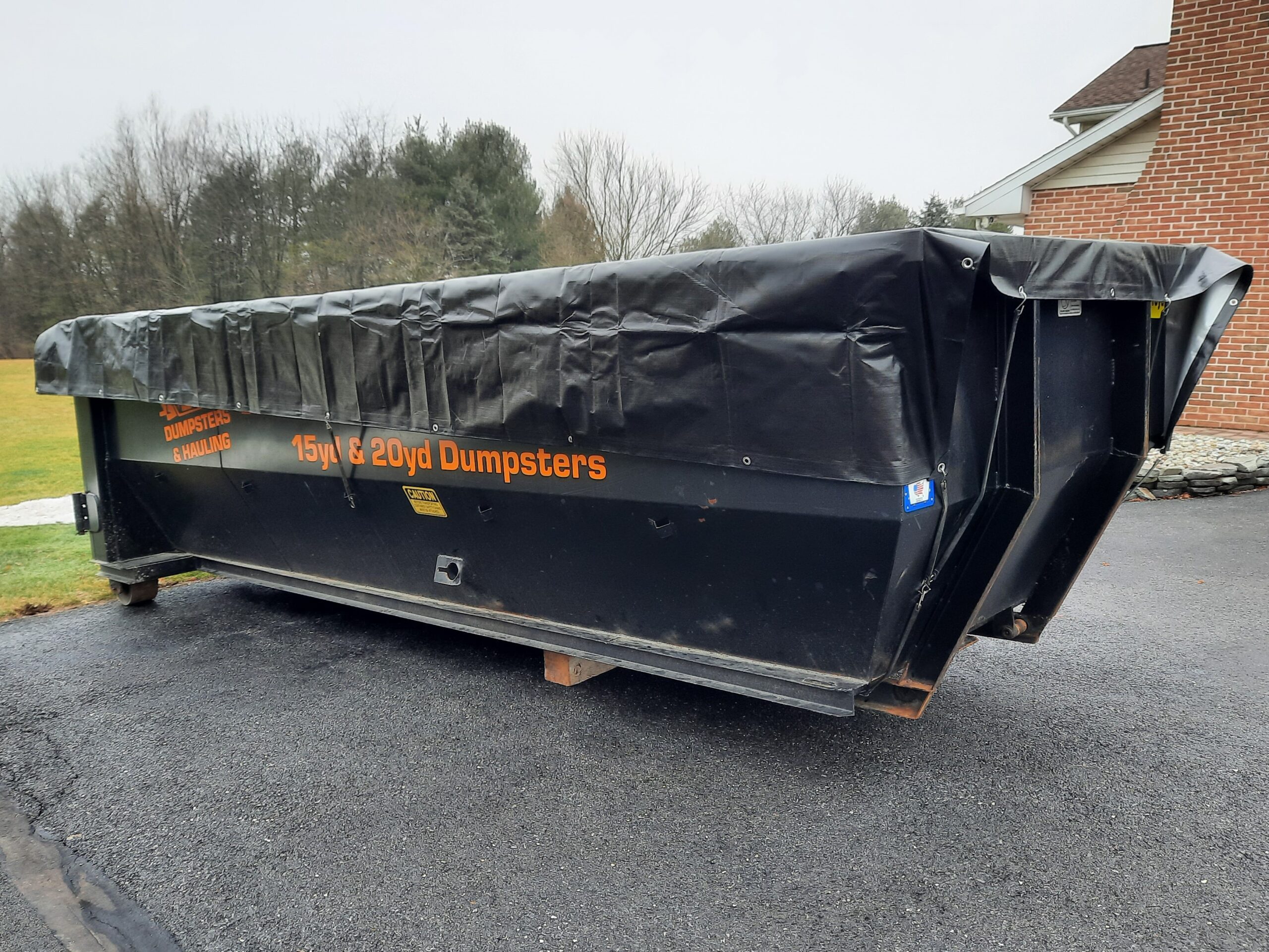 Tarp with Dumpster Rental